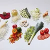 vegetable-slicing-machine-01 Vegetable slicing machine with interchangeable cutting heads