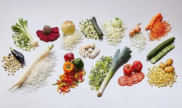 vegetable-slicing-machine-01 Vegetable slicing machine with interchangeable cutting heads