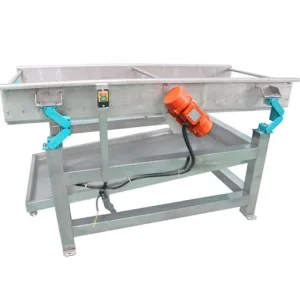 vibrating-dewatering-machine-01 Vibrating dewatering machine removing surface water from washed vegetables